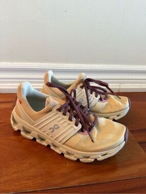 On Running Women's Beige Sneakers with Burgundy Laces